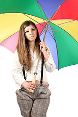 Image showing casual young woman with coloured umbrella