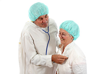Image showing mature doctor couple, team of doctors, healthcare photo