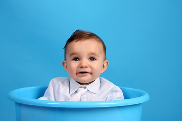 Image showing Portrait of a happy baby boy Isolated on blue background