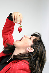 Image showing beautiful woman with beautiful red strawberries, healthy food