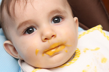 Image showing beautiful child eating soup, food child photo