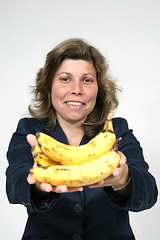 Image showing beautiful woman eating banana, healthy food