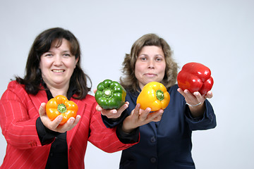 Image showing woman with colored peppers, healthy food photo