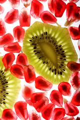 Image showing beautiful and fresh pomegranate grains and kiwi