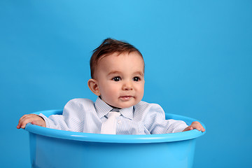 Image showing Portrait of a happy baby boy Isolated on blue background