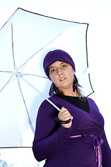 Image showing  beautiful woman in an autumn park 