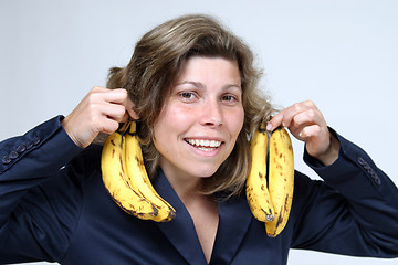 Image showing beautiful woman eating banana, healthy food