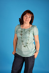 Image showing fashion woman on blue background studio shot