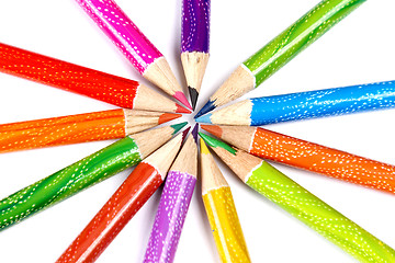 Image showing Assortment of coloured pencils with shadow on white background