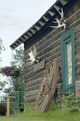 Image showing Decorated log cabin