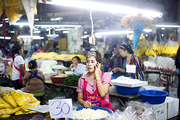 Image showing Seller at local market