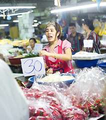 Image showing Seller at local market