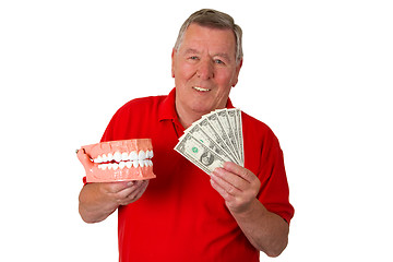 Image showing Male senior with teeth modell