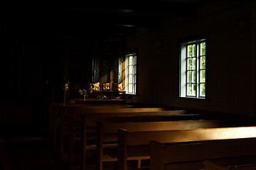 Image showing Gloomy rooms of church lighted by windows