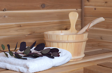 Image showing WAter bucket with ladle in sauna