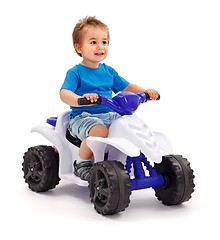 Image showing Little boy on toy car