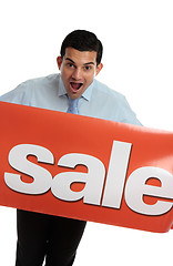 Image showing Ecstatic man with SALE sign