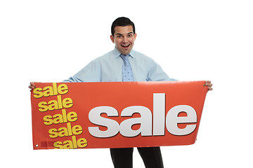 Image showing Excited man  holding a Sale sign