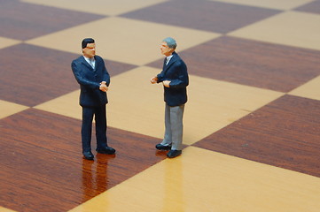 Image showing business man on a chess board