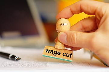 Image showing wage cut