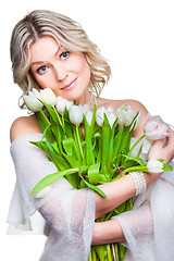 Image showing blonde woman with bouquet of tulips