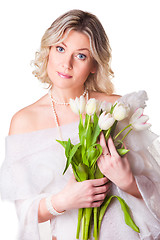 Image showing blonde woman with bouquet of tulips