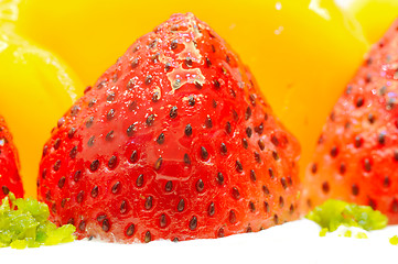 Image showing Strawberry and mango on the cake