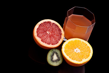 Image showing Mixed orange, kiwi and grapefruit juice