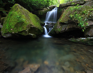 Image showing waterfall two boulders