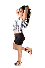 Image showing Girl standing in shorts.