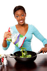 Image showing Health conscious woman preparing vegetables