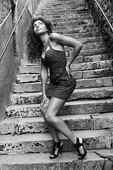 Image showing Attractive woman in a staircase