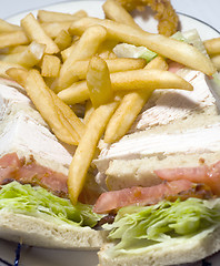 Image showing turkey club sandwich french fries