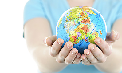 Image showing Hands holding globe