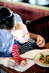 Image showing father feeding his son