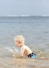 Image showing splashing toddler