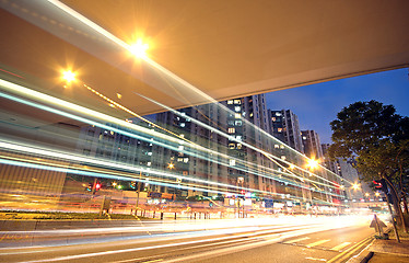 Image showing traffic in downtown at sunset moment