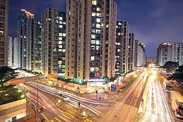 Image showing traffic in downtown at sunset moment