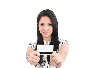 Image showing woman with a credit card on her hand, focus on woman