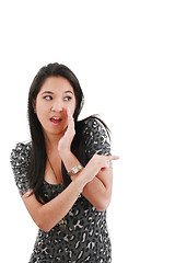 Image showing woman surprising and pointing at someone