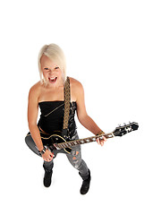 Image showing Screaming Woman Girl Playing Guitar