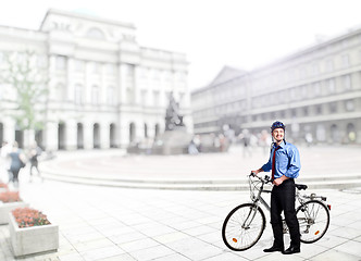 Image showing businessman with bicycle