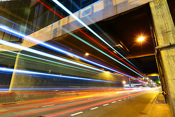 Image showing light trails in city at night