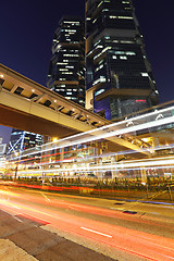 Image showing light trails in city at night