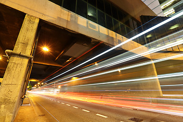 Image showing light trails in city at night