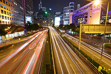 Image showing Fast moving cars at night