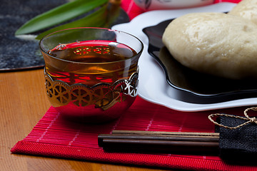 Image showing red tea and korean cakes pyan-se