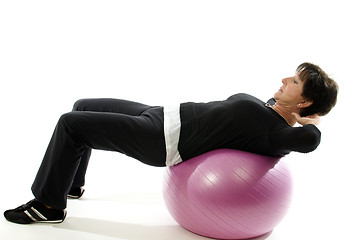 Image showing woman using core training fitness ball for abdominal crunch sit-