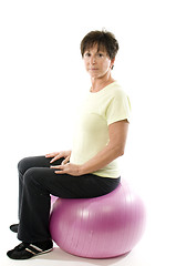 Image showing woman using core training fitness ball exercising