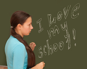 Image showing Girl schoolgirl meets an English lesson